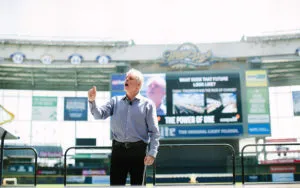 Mark Breslin speaking at a ballpark event