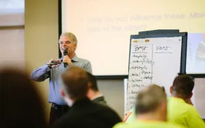 Mark Breslin leading a workshop with a flip chart